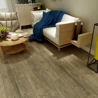 SP88015 5 mm loose lay vinyl plank in a grey-washed brown oak finish